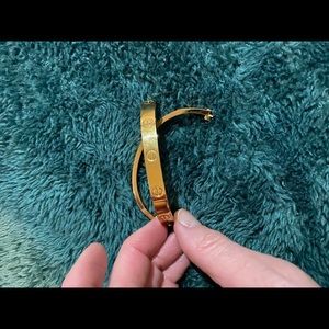 Love bracelet. Screws on wrist.